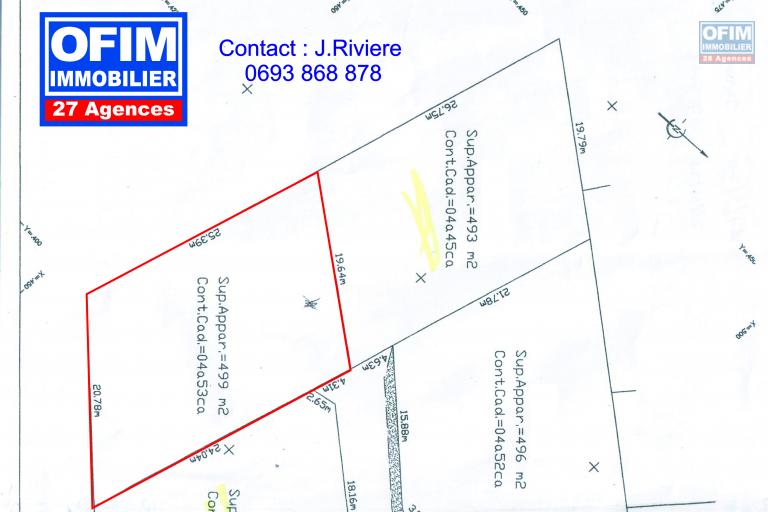 A vendre en exclusivité une parcelle viabilisée de 499 m² en lotissement résidentiel proche du centre ville de la plaine des Palmistes