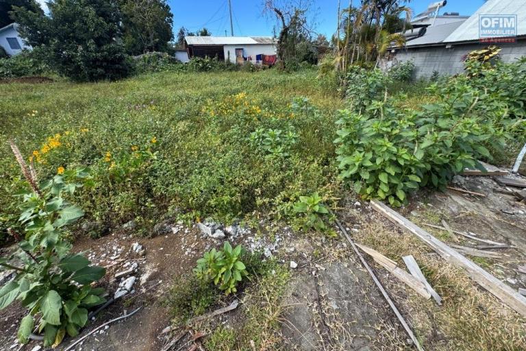 A vendre terrain plat de 405 m² à Bras de Pontho, secteur calme