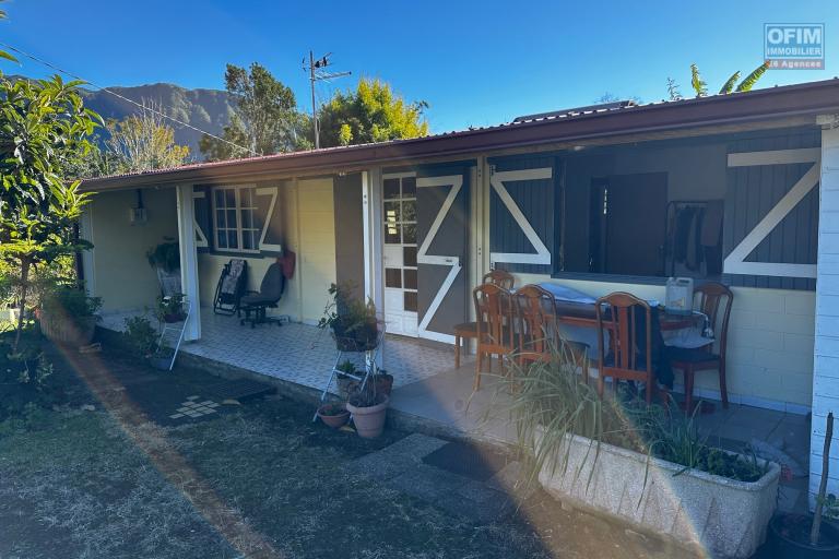 A vendre Maison Bourbon Bois type F3/4 au 2ème village de la plaine des palmistes sur 409 m² de terrain