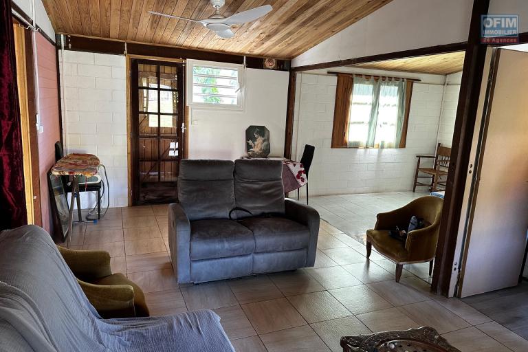 A vendre Maison Bourbon Bois type F3/4 au 2ème village de la plaine des palmistes sur 409 m² de terrain