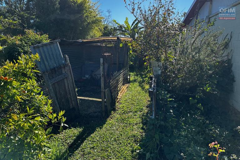 A vendre Maison Bourbon Bois type F3/4 au 2ème village de la plaine des palmistes sur 409 m² de terrain
