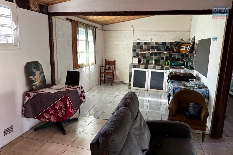 A vendre Maison Bourbon Bois type F3/4 au 2ème village de la plaine des palmistes sur 409 m² de terrain