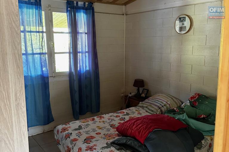 A vendre Maison Bourbon Bois type F3/4 au 2ème village de la plaine des palmistes sur 409 m² de terrain