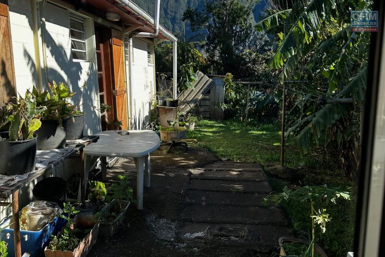 A vendre Maison Bourbon Bois type F3/4 au 2ème village de la plaine des palmistes sur 409 m² de terrain