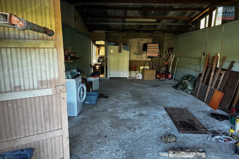 A vendre Maison Bourbon Bois type F3/4 au 2ème village de la plaine des palmistes sur 409 m² de terrain