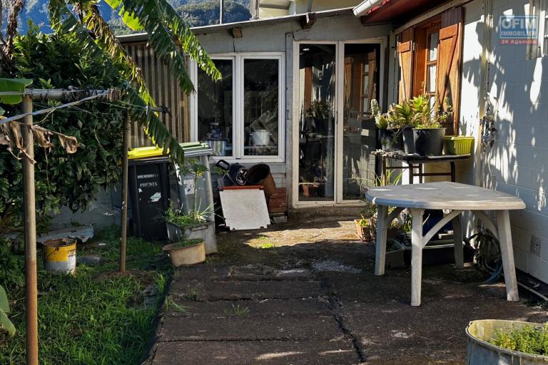 A vendre Maison Bourbon Bois type F3/4 au 2ème village de la plaine des palmistes sur 409 m² de terrain