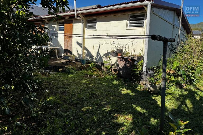 A vendre Maison Bourbon Bois type F3/4 au 2ème village de la plaine des palmistes sur 409 m² de terrain