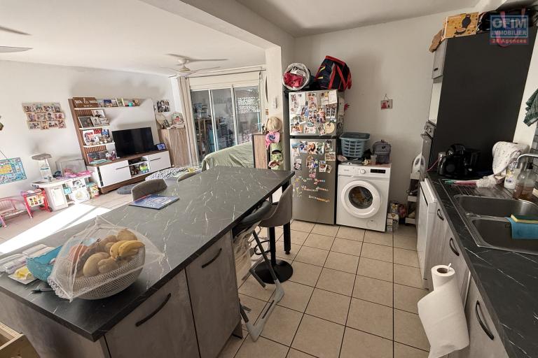 Maison jumelée de type F3, en R+1, d'une surface habitable de 71 m² + varangue de 12 m², jardin devant et derrière dans une résidence sécurisée en hyper-centre