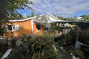 Jolie maison F4 plain pied construite en 1996 de 80 m2 habitables + 30 m2 de terrasse couverte et 30 m2 d'abris voiture implantée sur 350 m2