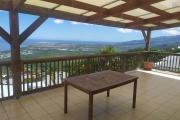 A LOUER VILLA F8/9 DE 160 M2 HABITABLE AVEC PISCINE ET BELLE VUE MER A ST PAUL