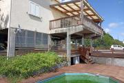 A LOUER VILLA F8/9 DE 160 M2 HABITABLE AVEC PISCINE ET BELLE VUE MER A ST PAUL