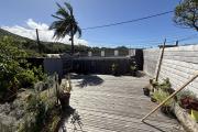 A Langevin une maison F4 + studio indépendant, vue mer, piscine hors sol, patio, à proximité de la route nationale et de l'océan.