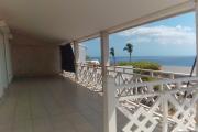Villa F4 Vue Mer  SAINT GILLES LES BAINS 173m2 habitable avec 3 Chambres, 1 grand balcon, 1 grand jardin, 2 salle d'eau, 2 WC et 1 salon spacieux