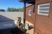 A louer petite maison F1 en bois dans une impasse