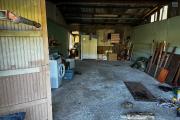 A vendre Maison Bourbon Bois type F3/4 au 2ème village de la plaine des palmistes sur 409 m² de terrain