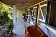 A vendre Maison Bourbon Bois type F3/4 au 2ème village de la plaine des palmistes sur 409 m² de terrain