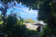 A vendre - Terrain SAINT-PAUL de 1012 m2,dont 910 m2 constructible -Vue sur mer - Bois Rouge