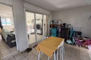 Maison jumelée de type F3, en R+1, d'une surface habitable de 71 m² + varangue de 12 m², jardin devant et derrière dans une résidence sécurisée en hyper-centre