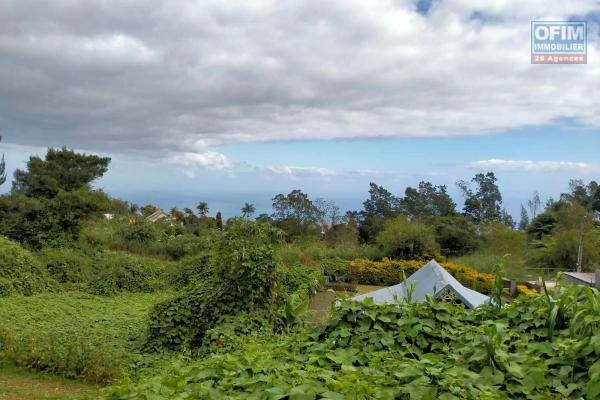 Terrain plat constructible de 817 m2 avec trés belle vue mer à Petite France  Maido