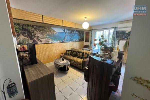 A vendre joli appartement F2 avec v&eacute;randa face au parc de la Trinit&eacute; - St Denis